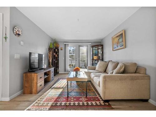 3207-402 Kincora Glen Road Nw, Calgary, AB - Indoor Photo Showing Living Room