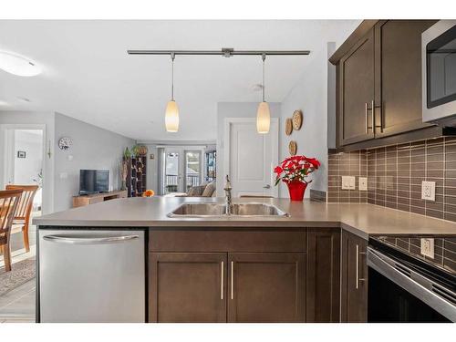 3207-402 Kincora Glen Road Nw, Calgary, AB - Indoor Photo Showing Kitchen With Double Sink