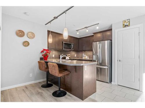 3207-402 Kincora Glen Road Nw, Calgary, AB - Indoor Photo Showing Kitchen With Stainless Steel Kitchen With Upgraded Kitchen