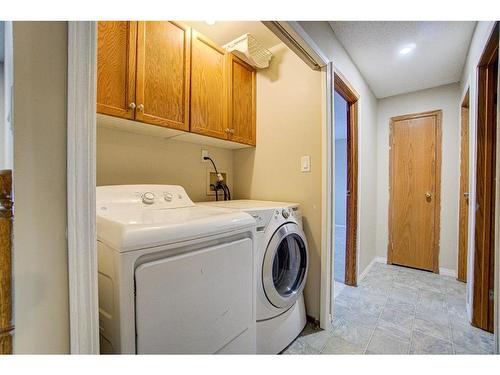 21 Westrose Avenue, Claresholm, AB - Indoor Photo Showing Laundry Room