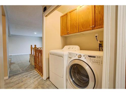 21 Westrose Avenue, Claresholm, AB - Indoor Photo Showing Laundry Room