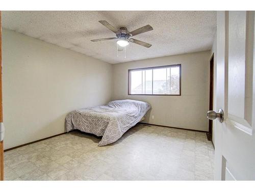 21 Westrose Avenue, Claresholm, AB - Indoor Photo Showing Bedroom