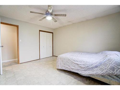 21 Westrose Avenue, Claresholm, AB - Indoor Photo Showing Bedroom