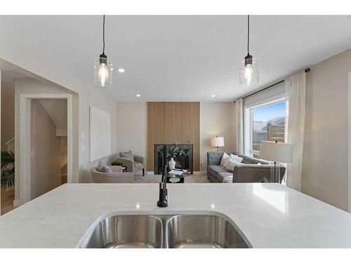 114 Bridleridge Circle Sw, Calgary, AB - Indoor Photo Showing Kitchen With Double Sink