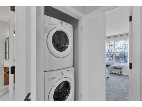 114 Bridleridge Circle Sw, Calgary, AB - Indoor Photo Showing Laundry Room