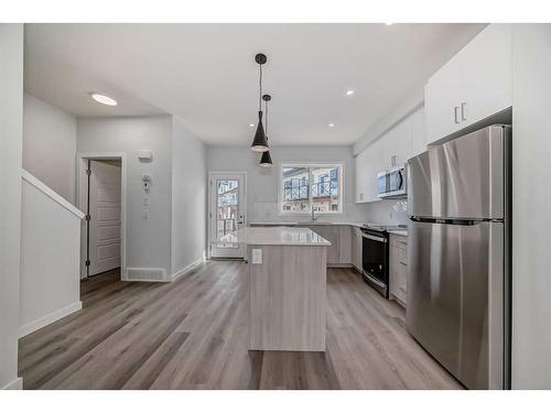 334 Ambleton Street Nw, Calgary, AB - Indoor Photo Showing Kitchen With Stainless Steel Kitchen