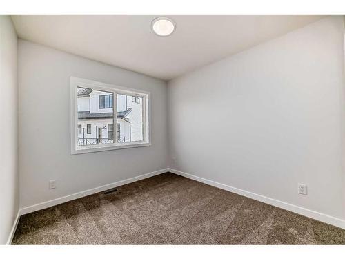 334 Ambleton Street Nw, Calgary, AB - Indoor Photo Showing Other Room