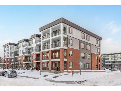 3415-111 Wolf Creek Drive Se, Calgary, AB - Outdoor With Balcony With Facade