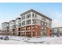 3415-111 Wolf Creek Drive Se, Calgary, AB  - Outdoor With Balcony With Facade 