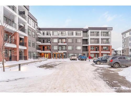 3415-111 Wolf Creek Drive Se, Calgary, AB - Outdoor With Balcony With Facade