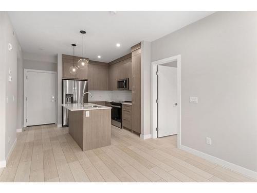 3415-111 Wolf Creek Drive Se, Calgary, AB - Indoor Photo Showing Kitchen