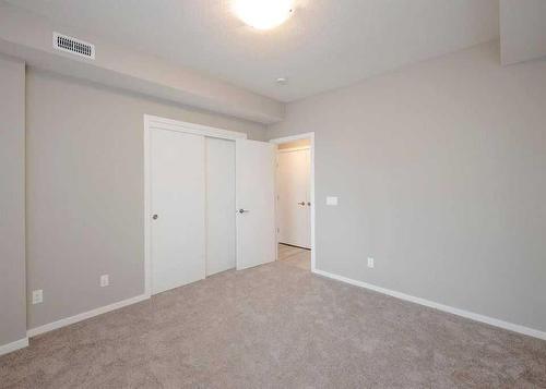 151 Redstone Drive Ne, Calgary, AB - Indoor Photo Showing Other Room