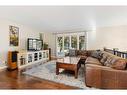 14427 Parkside Drive Se, Calgary, AB  - Indoor Photo Showing Living Room 