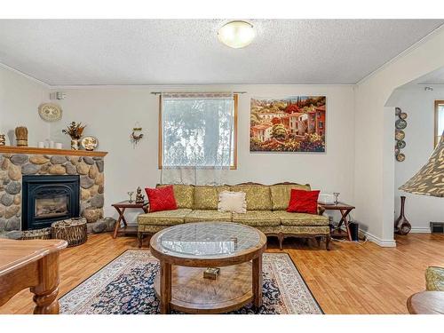 1614 3 Street Nw, Calgary, AB - Indoor Photo Showing Living Room With Fireplace