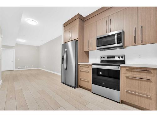 602 Rangeview Street Se, Calgary, AB - Indoor Photo Showing Kitchen With Stainless Steel Kitchen