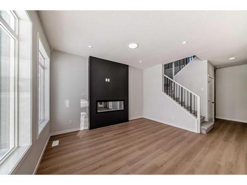 374 Corner Glen Way Ne, Calgary, AB - Indoor With Fireplace