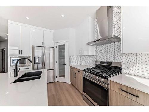 374 Corner Glen Way Ne, Calgary, AB - Indoor Photo Showing Kitchen With Double Sink With Upgraded Kitchen