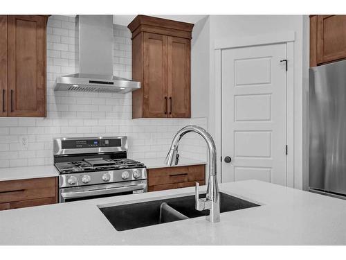 50 Lucas Place Nw, Calgary, AB - Indoor Photo Showing Kitchen With Stainless Steel Kitchen With Double Sink