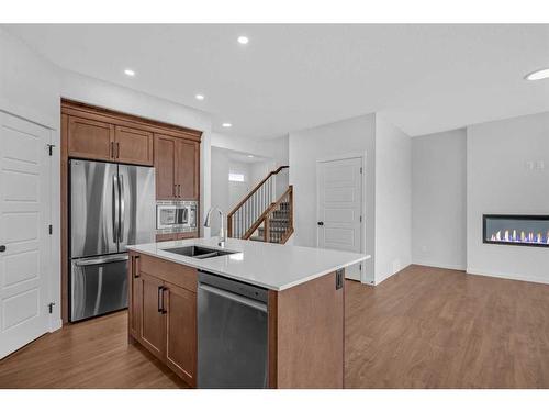 50 Lucas Place Nw, Calgary, AB - Indoor Photo Showing Kitchen With Stainless Steel Kitchen With Double Sink