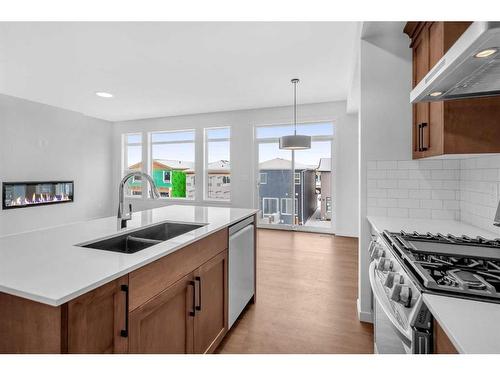 50 Lucas Place Nw, Calgary, AB - Indoor Photo Showing Kitchen With Stainless Steel Kitchen With Double Sink With Upgraded Kitchen