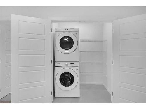 50 Lucas Place Nw, Calgary, AB - Indoor Photo Showing Laundry Room