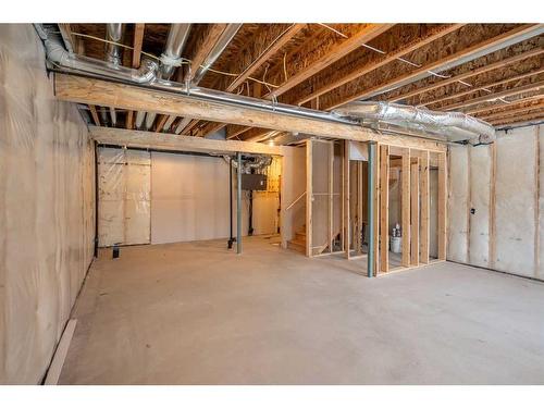 50 Lucas Place Nw, Calgary, AB - Indoor Photo Showing Basement