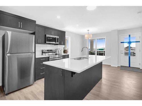 281 Yorkville Boulevard Sw, Calgary, AB - Indoor Photo Showing Kitchen With Stainless Steel Kitchen With Double Sink With Upgraded Kitchen