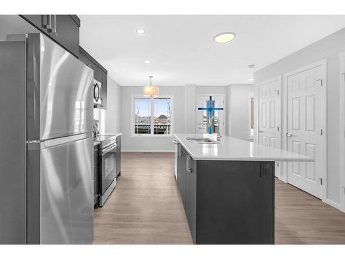 281 Yorkville Boulevard Sw, Calgary, AB - Indoor Photo Showing Kitchen With Stainless Steel Kitchen With Double Sink