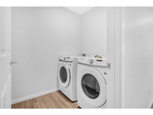 281 Yorkville Boulevard Sw, Calgary, AB - Indoor Photo Showing Laundry Room