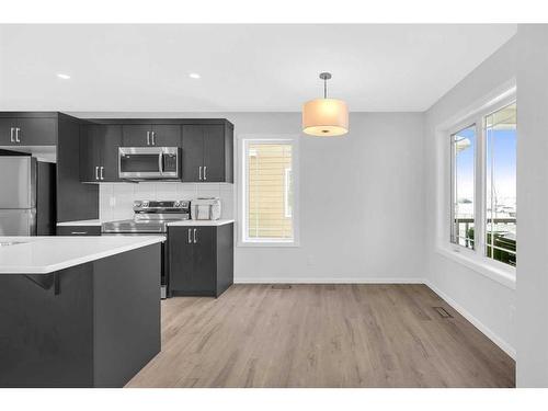 281 Yorkville Boulevard Sw, Calgary, AB - Indoor Photo Showing Kitchen With Stainless Steel Kitchen