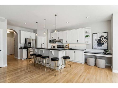 3 Spring Mews Sw, Calgary, AB - Indoor Photo Showing Kitchen With Stainless Steel Kitchen With Upgraded Kitchen