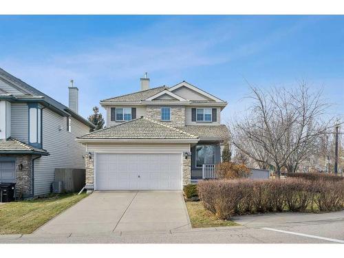 3 Spring Mews Sw, Calgary, AB - Outdoor With Facade