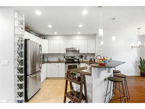 2-1909 25A Street Sw, Calgary, AB - Indoor Photo Showing Kitchen With Upgraded Kitchen