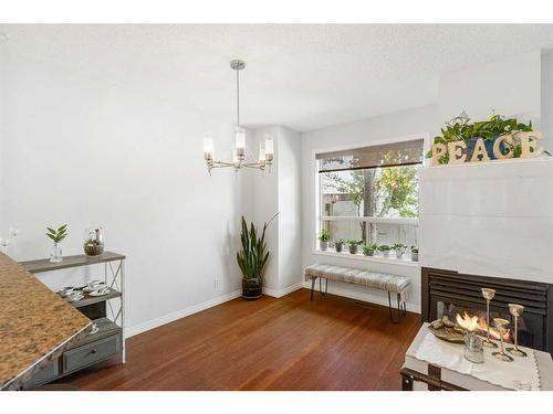 2-1909 25A Street Sw, Calgary, AB - Indoor With Fireplace