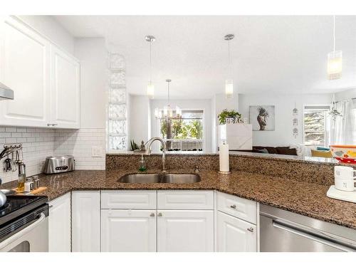 2-1909 25A Street Sw, Calgary, AB - Indoor Photo Showing Kitchen With Double Sink With Upgraded Kitchen