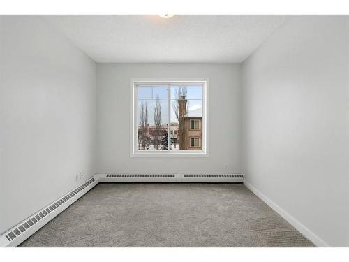 217 Mckenzie Towne Lane Se, Calgary, AB - Indoor Photo Showing Other Room