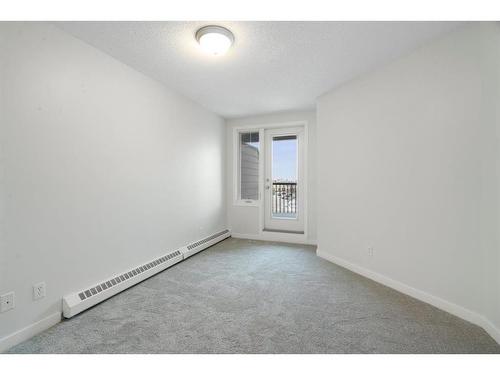 217 Mckenzie Towne Lane Se, Calgary, AB - Indoor Photo Showing Other Room