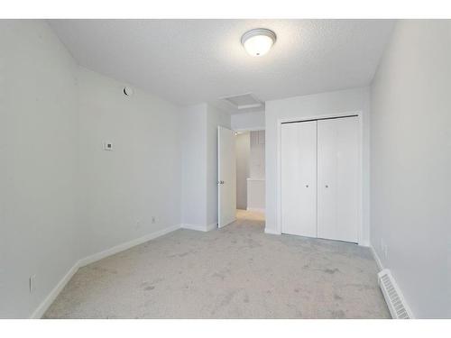 217 Mckenzie Towne Lane Se, Calgary, AB - Indoor Photo Showing Other Room