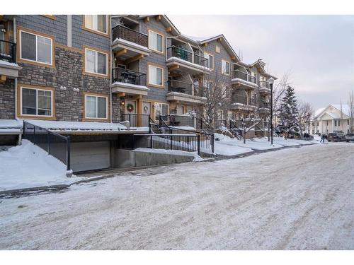 217 Mckenzie Towne Lane Se, Calgary, AB - Outdoor With Balcony With Facade