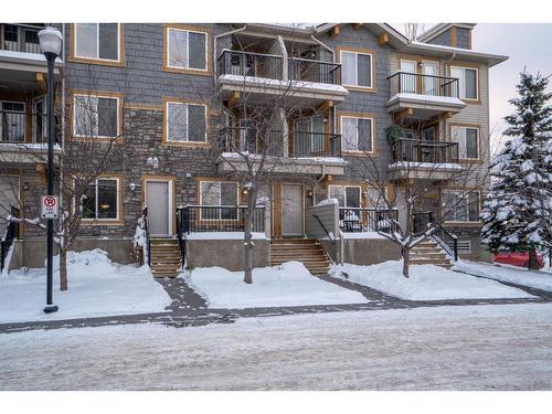 217 Mckenzie Towne Lane Se, Calgary, AB - Outdoor With Balcony With Facade