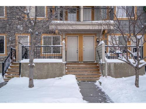 217 Mckenzie Towne Lane Se, Calgary, AB - Outdoor With Balcony With Facade