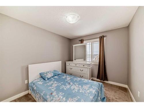 43 Baysprings Way Sw, Airdrie, AB - Indoor Photo Showing Bedroom