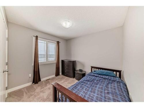 43 Baysprings Way Sw, Airdrie, AB - Indoor Photo Showing Bedroom