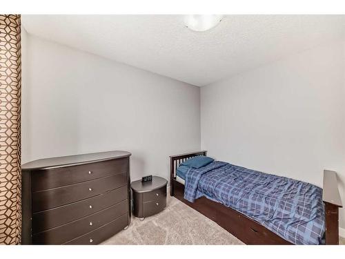 43 Baysprings Way Sw, Airdrie, AB - Indoor Photo Showing Bedroom