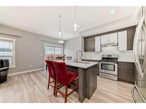 43 Baysprings Way Sw, Airdrie, AB - Indoor Photo Showing Kitchen With Stainless Steel Kitchen With Upgraded Kitchen