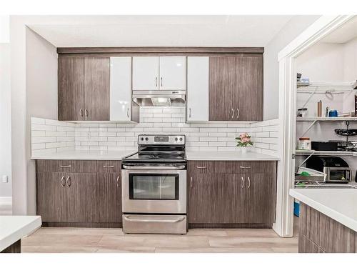 43 Baysprings Way Sw, Airdrie, AB - Indoor Photo Showing Kitchen With Upgraded Kitchen