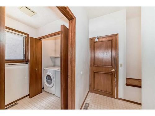 236 Scenic Hill Close Nw, Calgary, AB - Indoor Photo Showing Laundry Room