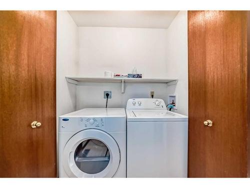 236 Scenic Hill Close Nw, Calgary, AB - Indoor Photo Showing Laundry Room