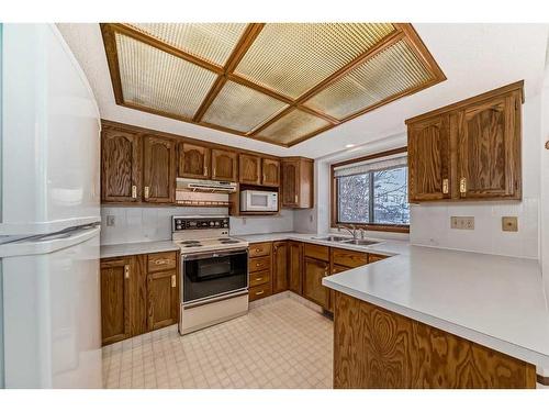 236 Scenic Hill Close Nw, Calgary, AB - Indoor Photo Showing Kitchen With Double Sink