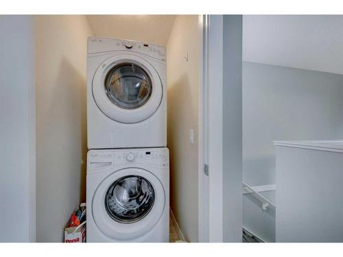 135 Baysprings Terrace, Airdrie, AB - Indoor Photo Showing Laundry Room